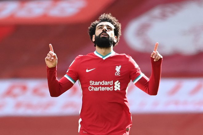 Mohamed Salah je s 1. julijem vstopil v zadnje leto trenutne pogodbe z angleškim velikanom. FOTO: Laurence Griffiths/AFP
