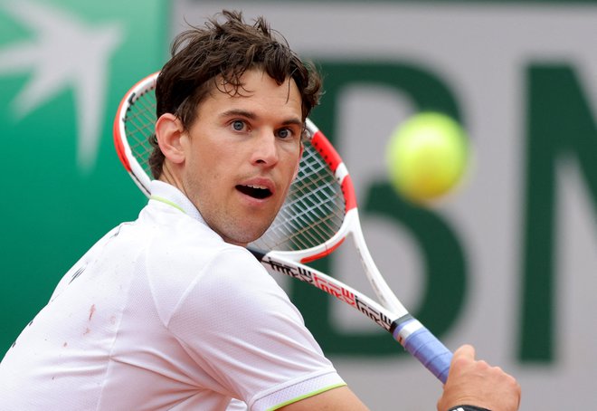 Dominic Thiem med obračunom letošnjega OP Francije v Parizu z Bolivijcem Hugom Dellienom. FOTO: Pascal Rossignol/Reuters
