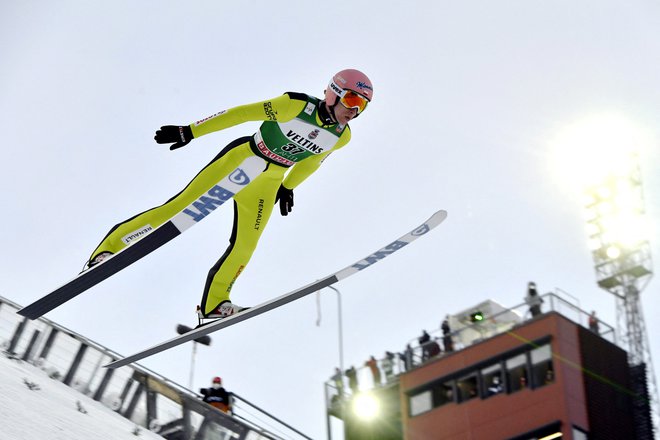 Dawid Kubacki (na fotografiji) med februarskim nastopom v finskem Lahtiju. FOTO: Lehtikuva/Reuters
