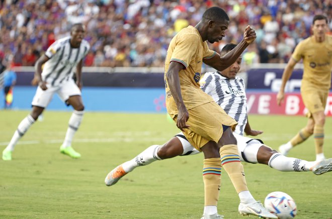 Ousmane Dembele je dosegel oba gola za Barcelono. FOTO: Ron Jenkins/AFP
