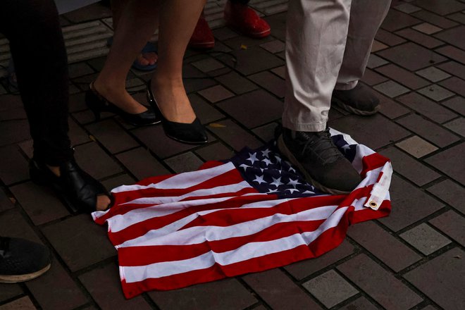 Nasprotniki prenagljeno trdijo, da gre za &raquo;provokacijo&laquo; v napačnem trenutku, ki bi se lahko končala z vojno z nepredvidljivimi posledicami. FOTO: Ann Wang Reuters
