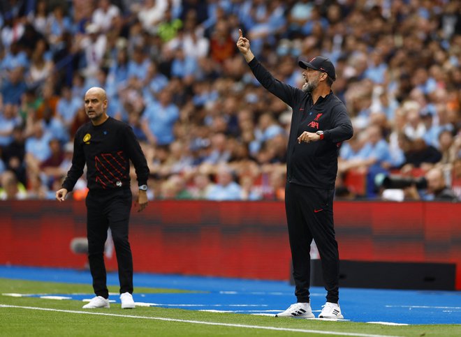 Pep Guardiola in Jürgen Klopp sta velika tekmeca, vendar se tudi spoštujeta. FOTO: Andrew Boyers/Reuters
