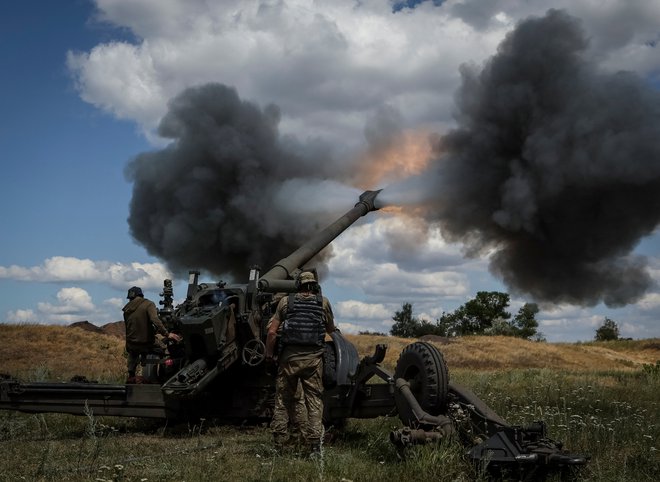 Ukrajinski vojaki v Donbasu. FOTO: Gleb Garanič/Reuters
