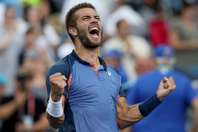 Borna Ćorić se je takole veselil zmage na mastersu v Cincinnatiju. FOTO: Matthew Stockman/AFP
