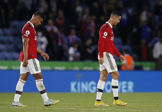 Cristiano Ronaldo in Casemiro sta igrala le v drugem polčasu. FOTO: Craig Brough/Reuters
