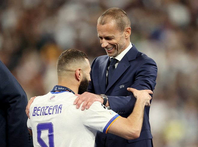 Karim Benzema je bil eden glavnih akterjev madridskega Reala na poti proti naslovu prvaka, to je ocenil tudi predsednik Uefe Aleksander Čeferin. FOTO: Molly Darlington/Reuters
