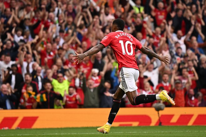 Marcus Rashford se veseli drugega zadetka Manchester Uniteda na Old Traffordu proti Arsenalu. FOTO: Oli Scarff/AFP
