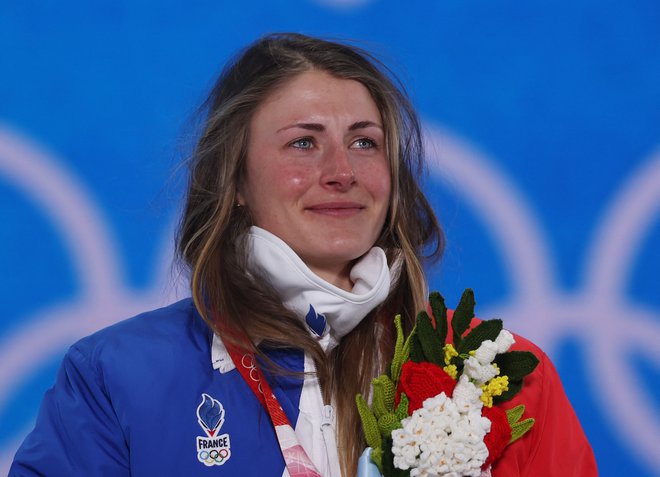 Pred Justine Braisaz-Bouchet je nekoliko drugačno leto. FOTO: Lindsey Wasson/Reuters
