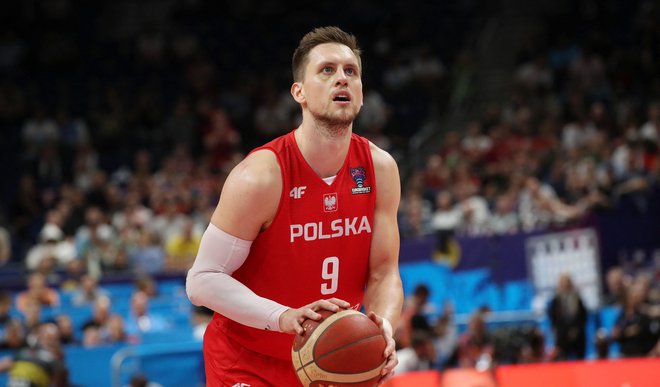 Mateusz Ponitka je četrti košarkar v zgodovini evropskih prvesjtev, ki je dosegel trojni dvojček. FOTO: Oliver Behrendt/AFP
