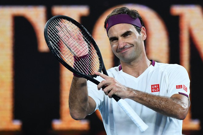 Roger Federer bo teniški lopar obesil na klin. FOTO: William West/AFP
