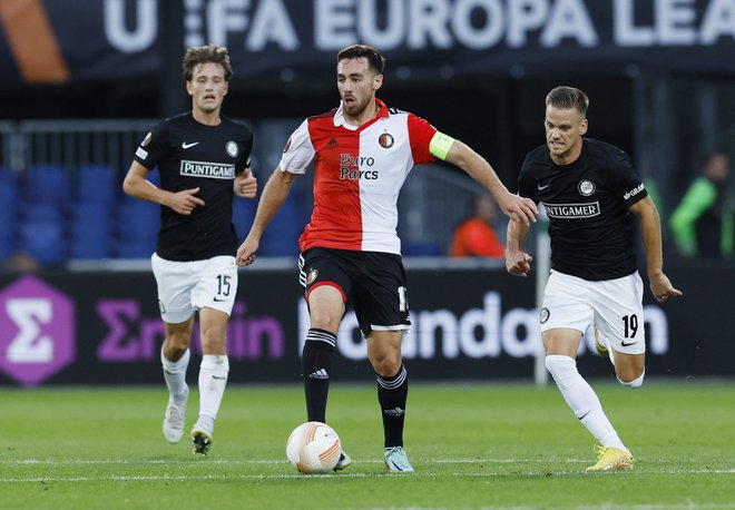 Feyenoord je bil za razred boljši od graškega Sturma (na fotografiji desno Tomi Horvat). FOTO: Piroschka Van De Wouw/Reuters
