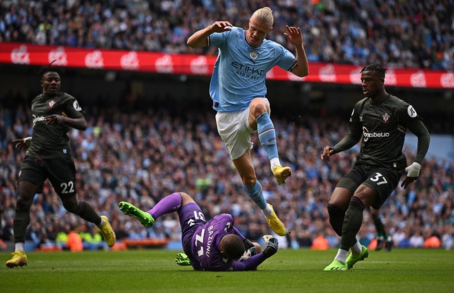 Erling Haaland in Manchester City sta preskočila novo oviro. FOTO: Oli Scarff/AFP

