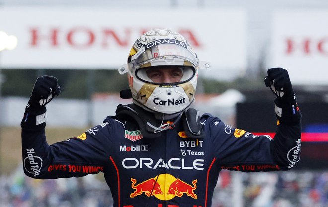 Max Verstappen je novi-stari svetovni prvak v formuli 1. FOTO: Issei Kato/Reuters
