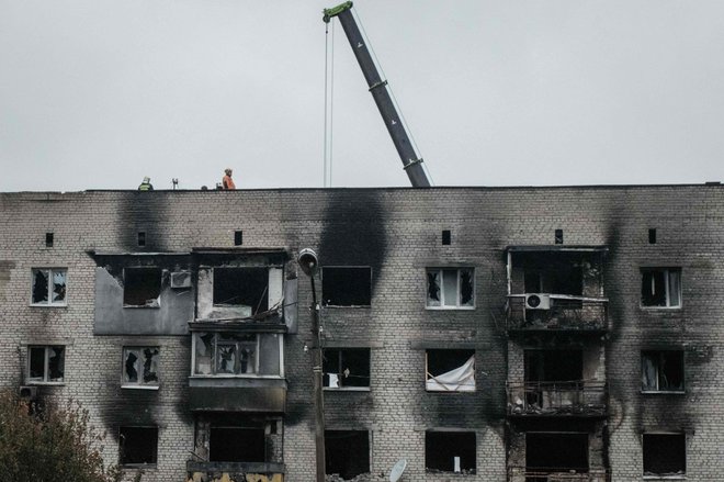 Izjum po napadu ruskih sil. FOTO: Jasujoši Čiba/AFP
