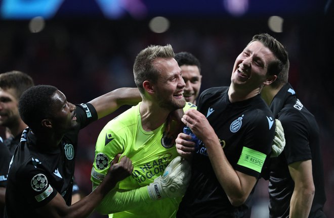 Simon Mignolet (na sredini) je bil med Bruggejevimi junaki. FOTO: Violeta Santos Moura/Reuters
