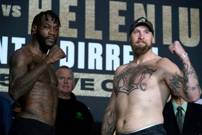 Deontay Wilder (levo) in Robert Helenius napovedujeta vrhunski dvoboj. FOTO: Timothy A. Clary/AFP
