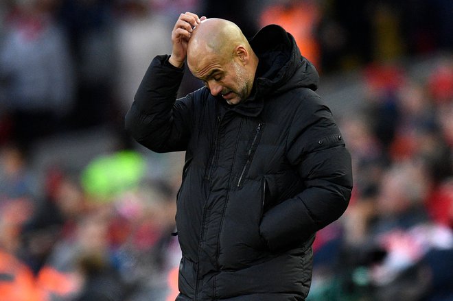 Po razveljavljenem zadetku Phila Fodna se je Pep Guardiola (na fotografiji) obrnil proti navijačem Liverpoola in jih morda tudi usodno izzval, da so nato ponesli svoje ljubljence do velike zmage. FOTO: Oli Scarff/AFP
