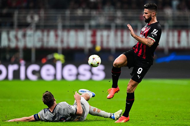 Olivier Giroud je bil dvakratni strelec za Milan. FOTO: Miguel Medina/AFP
