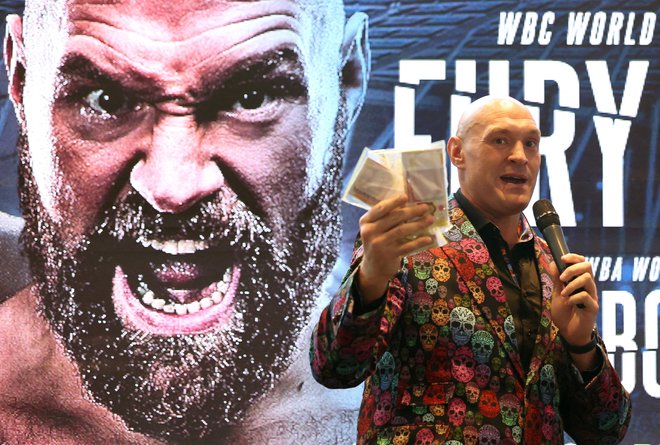 Tyson Fury se še ne namerava športno upokojiti. FOTO: Paul Childs/Reuters
