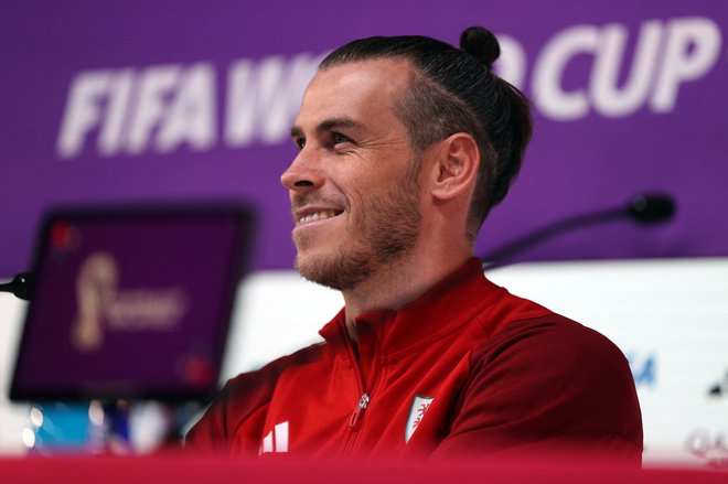 Gareth Bale uživa v valižanski reprezentanci, ki z njim v glavni vlogi piše najlepša poglavja. FOTO: Adrian Dennis/AFP
