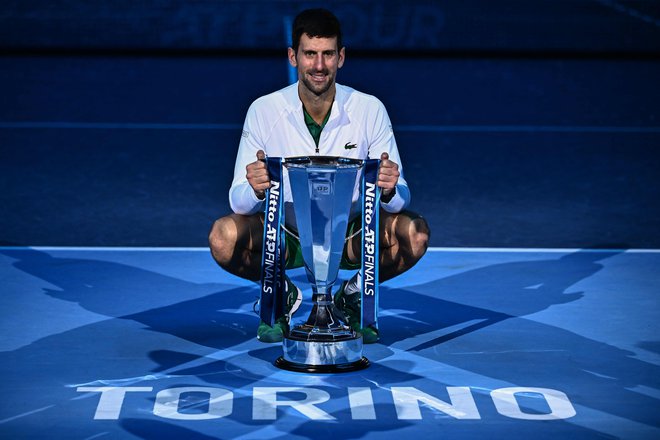 Novak Đoković se je od sezone poslovil z lovoriko in 4,5 milijona evrov nagrade.FOTO:&nbsp;Marco Bertorello/AFP
