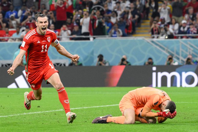 Gareth Bale je postavil končni izid na tekmi med ZDA in Walesom. FOTO: Nicolas Tucat/AFP
