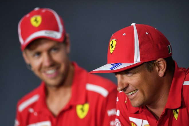 Sebastian Vettel in&nbsp;Kimi Räikkönen sta bila prijatelja tudi zunaj igrišča. FOTO: Andrej Isakovic/AFP
