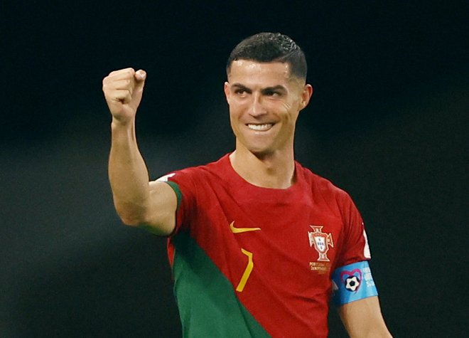 Cristiano Ronaldo se je vpisal v zgodovino. FOTO: Hannah Mckay/Reuters
