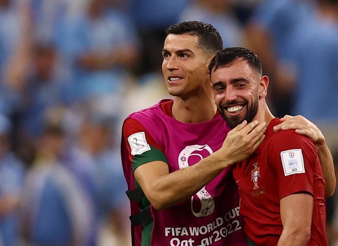 Cristiano Ronaldo in Bruno Fernandes FOTO: Kai Pfaffenbach/Reuters
