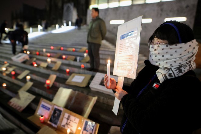 Tudi drugje po svetu podpirajo kitajske protestnike. Prizor je iz Kölna. FOTO: Thilo Schmuelgen/Reuters
