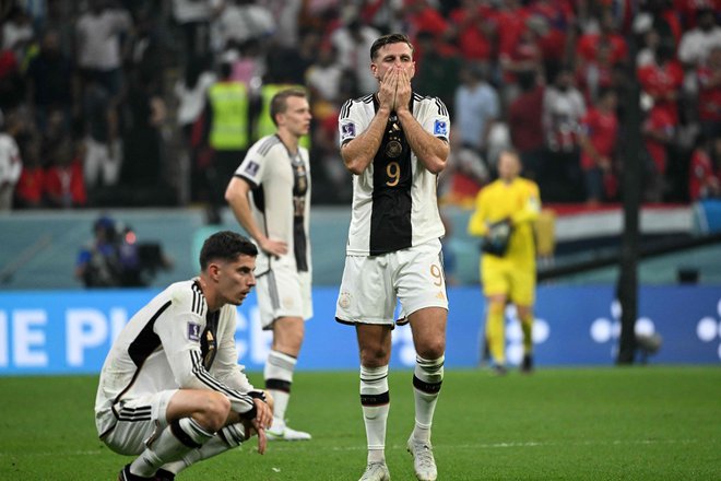 Nemci, svetovni prvaki iz leta 2014, so končali z nastopi na mundialu v Katarju. FOTO: Ina Fassbender/AFP
