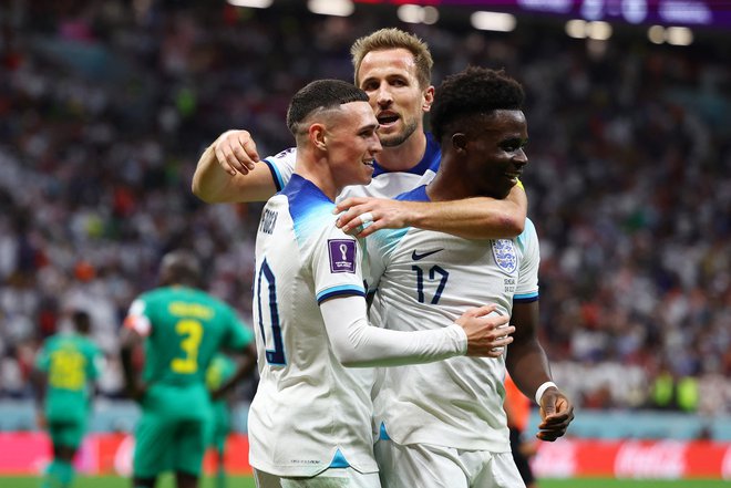 Anglija si je četrtfinalno vstopnico na svetovnem prvenstvu v nogometu priigrala zanesljivo, Harry Kane pa je odlično igro kronal tudi s prvim golom v Katarju. FOTO: Kai Pfaffenbach/Reuters
