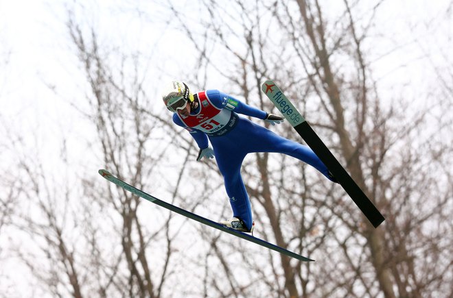 Timi Zajc je bil danes med najdaljšimi v Titisee-Neustadtu. FOTO: Kacper Pempel/Reuters
