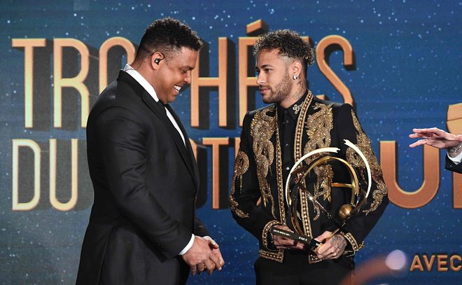 Ronaldo je še vedno Fenomen in brazilska ikona, ki je z goli popeljal Brazilijo do zadnjega, petega naslova svetovnih prvakov, medtem ko Neymar nima sreče na mundialih z reprezentanco. FOTO: Franck Fife/AFP
