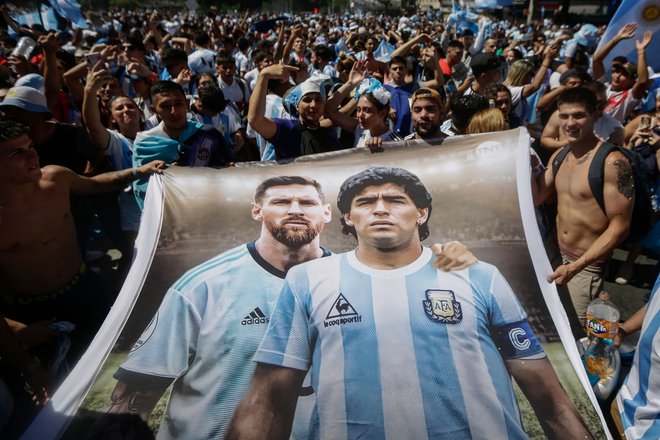 Lionel Messi se je v očeh argentinskih navijačev končno pridružil Diegu Maradoni med nesmrtnimi. FOTO: Emiliano Lasalvia/AFP
