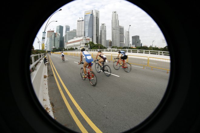 Triatlon, ki pelje v puščave in visoka gorovja, v oceane in urbano džunglo ... Vse to je ironman. FOTO: Vivek Prakash/Reuters
