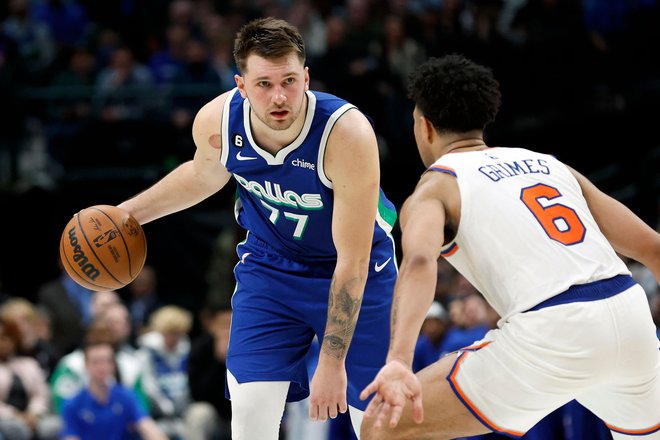 Podatki o statističnem rekordu, ki ga je Luka Dončić dosegel 27. decembra, ne povedo vsega. Iz številk se vesoljska čarovnija je vidi. FOTO: Tim Heitman/Getty Images/AFP
