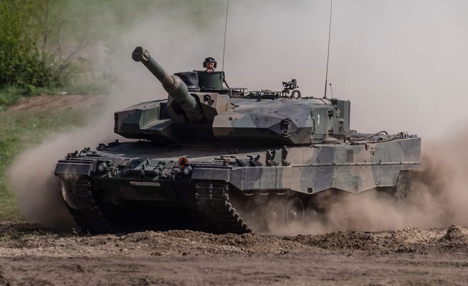 Nemške tanke v uporabi poljske vojske so preizkušali na mednarodnih vajah na Poljskem.&nbsp;&nbsp;FOTO: Wojtek Radwanski/AFP
