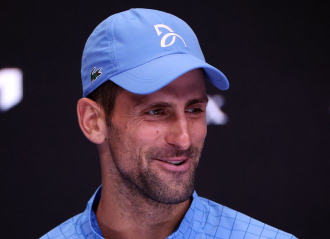 Novak Đoković po zmagi nad Američanom v četrtfinalu OP Avstralije. FOTO:&nbsp;Loren Elliott/Reuters
