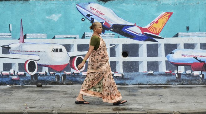 Družba Air India je ta teden od Boeinga in Airbusa naročila 470 letal. FOTO: Indranil Aditya Nurphoto Via Afp
