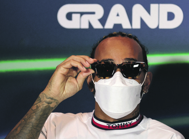 Lewis Hamilton ne bi imel zaprtih ust. FOTO: Ahmed Yosri/Reuters
