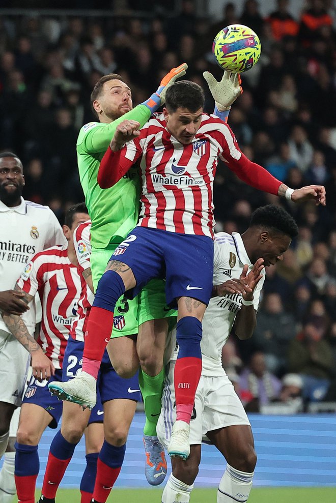 Jan Oblak po vstopu v novo leto v povprečju prejme manj kot gol na tekmo. FOTO: Pierre-Philippe Marcou/AFP
