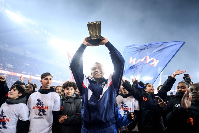 Kylian Mbappe je pred tekmo sezone, povratno osmine finala lige prvakov proti Bayernu v Münchnu, postal tudi strelski kralj kluba, ki domuje na štadionu Park princev. FOTO: Franck Fife/AFP
