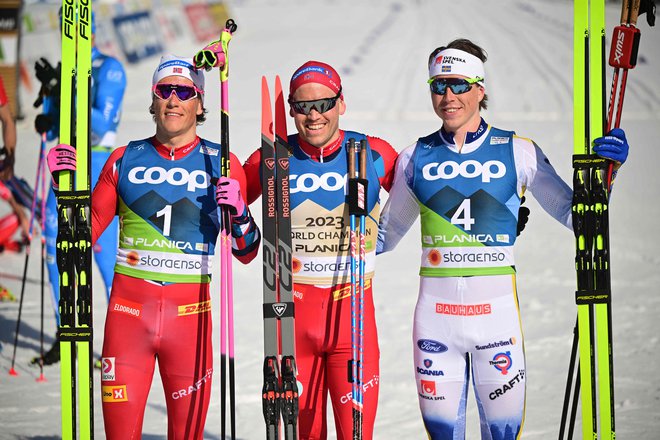 Zmagovalna trojica teka na 50 km. FOTO: Jure Makovec/AFP
