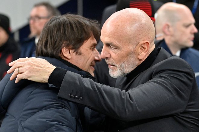 Stefano Pioli (desno) je bil veliki zmagovalec italijanskega dvoboja trenerjev v osmini finala lige prvakov med Tottenhamom in Milanom. FOTO: Justin Tallis/AFP
