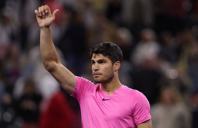 Carlos Alcaraz je v Indian Wellsu prišel do 100. zmage v profesionalni karieri in je na dobri poti, da se vrne na vrh lestvice ATP. FOTO: Julian Finney/AFP
