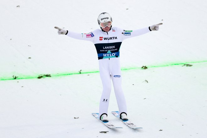 Anže Lanišek se je takole veselil novih stopničk. FOTO:&nbsp;Geir Olsen/AFP
