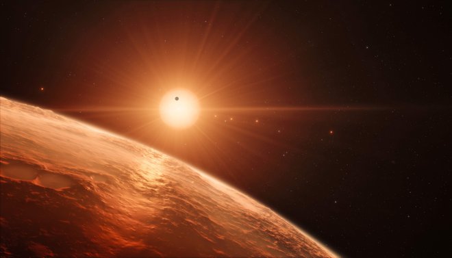 Umetniška upodobitev enega izmed planetov v sistemu Trappist 1. FOTO: ESO/M. Kornmesser/AFP
