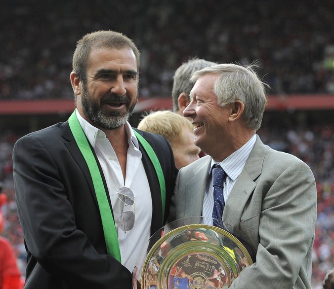 Eric Cantona (levo) je bil ključni mož Alexa Fergusona (desno) pri preobrazbi Manchester Uniteda v zmagovalno moštvo in klub. FOTO: Nigel Roddis/Reuters