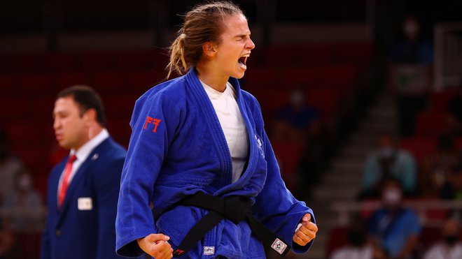 Naša judoistka se je veselila brona. FOTO: Sergio Perez/Reuters